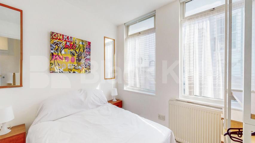 Nestled within a peaceful South Hampstead mews, this three-bedroom freehold home Hermit Place, London, NW6,  London