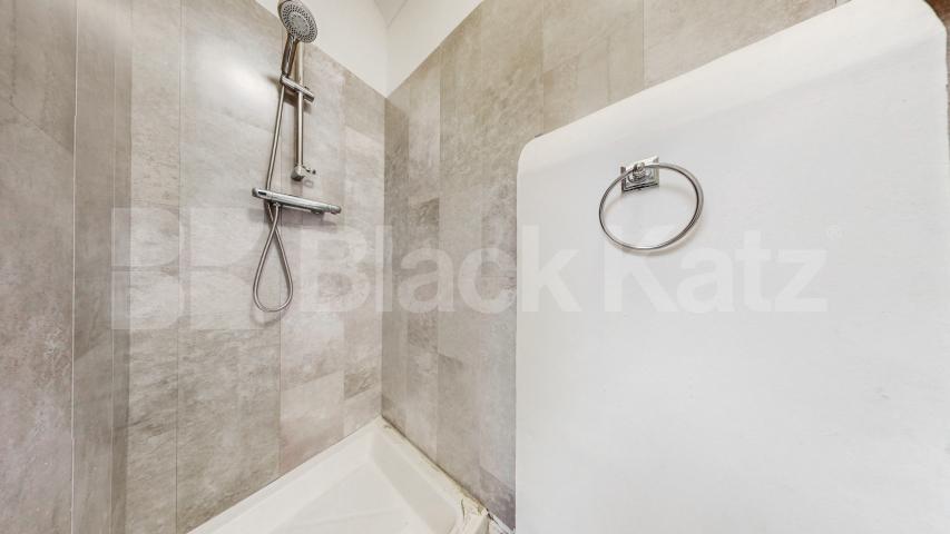 Nestled within a peaceful South Hampstead mews, this three-bedroom freehold home Hermit Place, London, NW6,  London