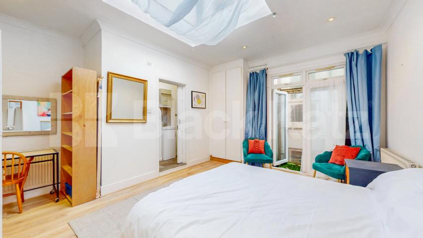 Nestled within a peaceful South Hampstead mews, this three-bedroom freehold home Hermit Place, London, NW6,  London