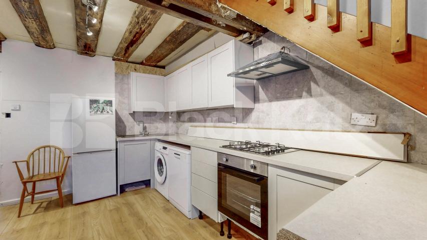 Nestled within a peaceful South Hampstead mews, this three-bedroom freehold home Hermit Place, London, NW6,  London