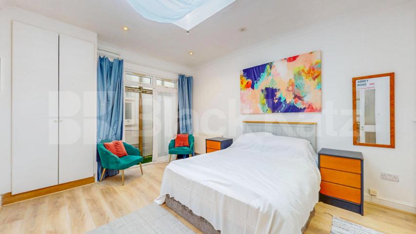 Nestled within a peaceful South Hampstead mews, this three-bedroom freehold home Hermit Place, London, NW6,  London