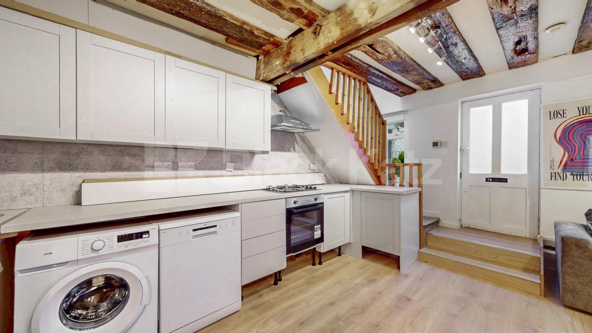 Nestled within a peaceful South Hampstead mews, this three-bedroom freehold home Hermit Place, London, NW6,  London