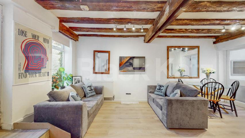 Nestled within a peaceful South Hampstead mews, this three-bedroom freehold home Hermit Place, London, NW6,  London