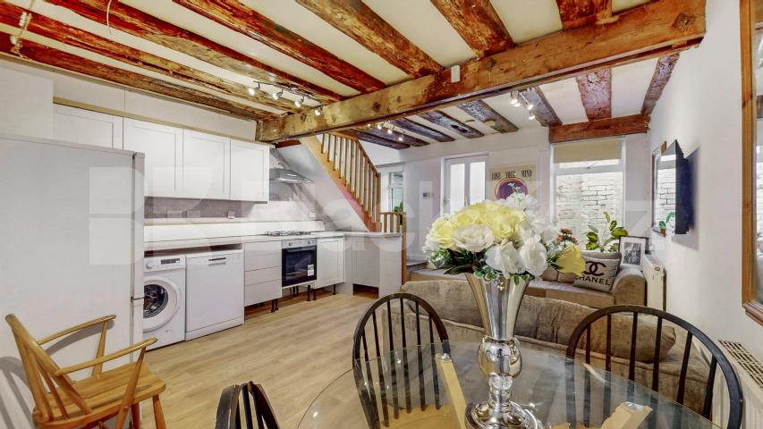 Nestled within a peaceful South Hampstead mews, this three-bedroom freehold home Hermit Place, London, NW6,  London