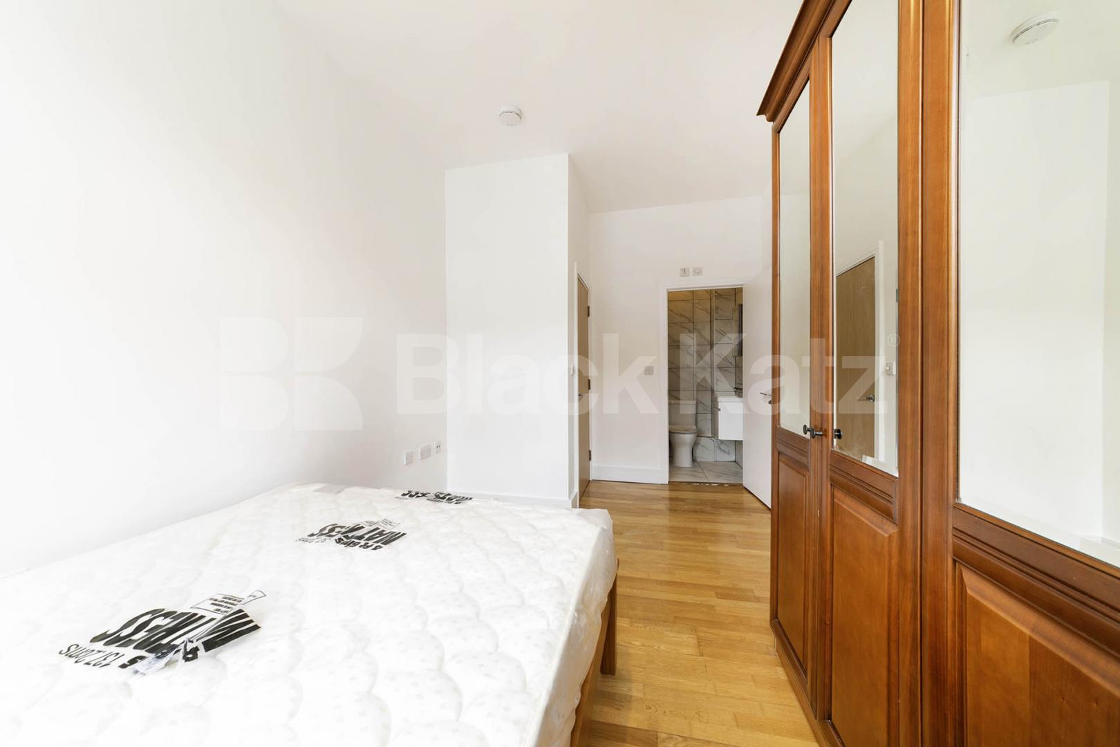 Located on the sought-after Charteris Road in the heart of Queens Park, this beautifully redecorated two-bedroom, two-bathroom apartment offers stylish and contemporary living.The property features two generous double bedrooms, both with space for de Charteris Road, Queens Park, NW6,  London