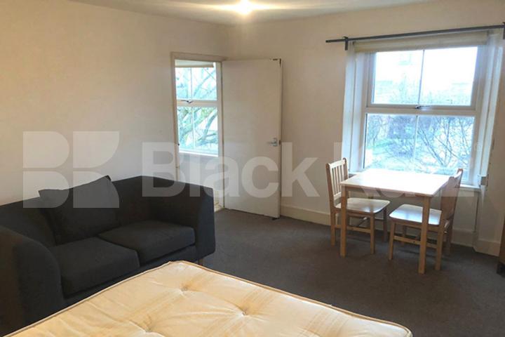 Spacious studio located within a period conversion with a separate kitchen Camden Road, Camden Borders 