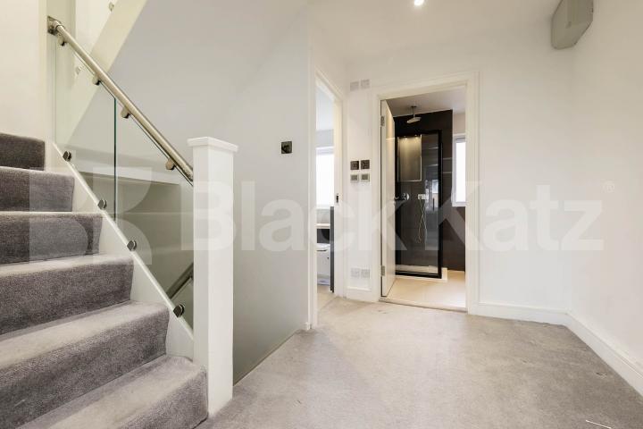 This beautifully presented three-bedroom split-level house is located on the sought-after Lennon Road in the heart of Willesden Green Marley Walk, London, NW2,  London