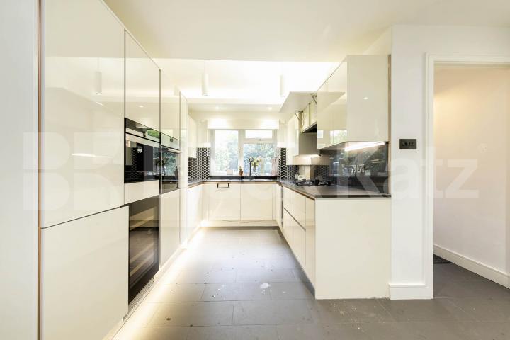 This beautifully presented three-bedroom split-level house is located on the sought-after Lennon Road in the heart of Willesden Green Marley Walk, London, NW2,  London