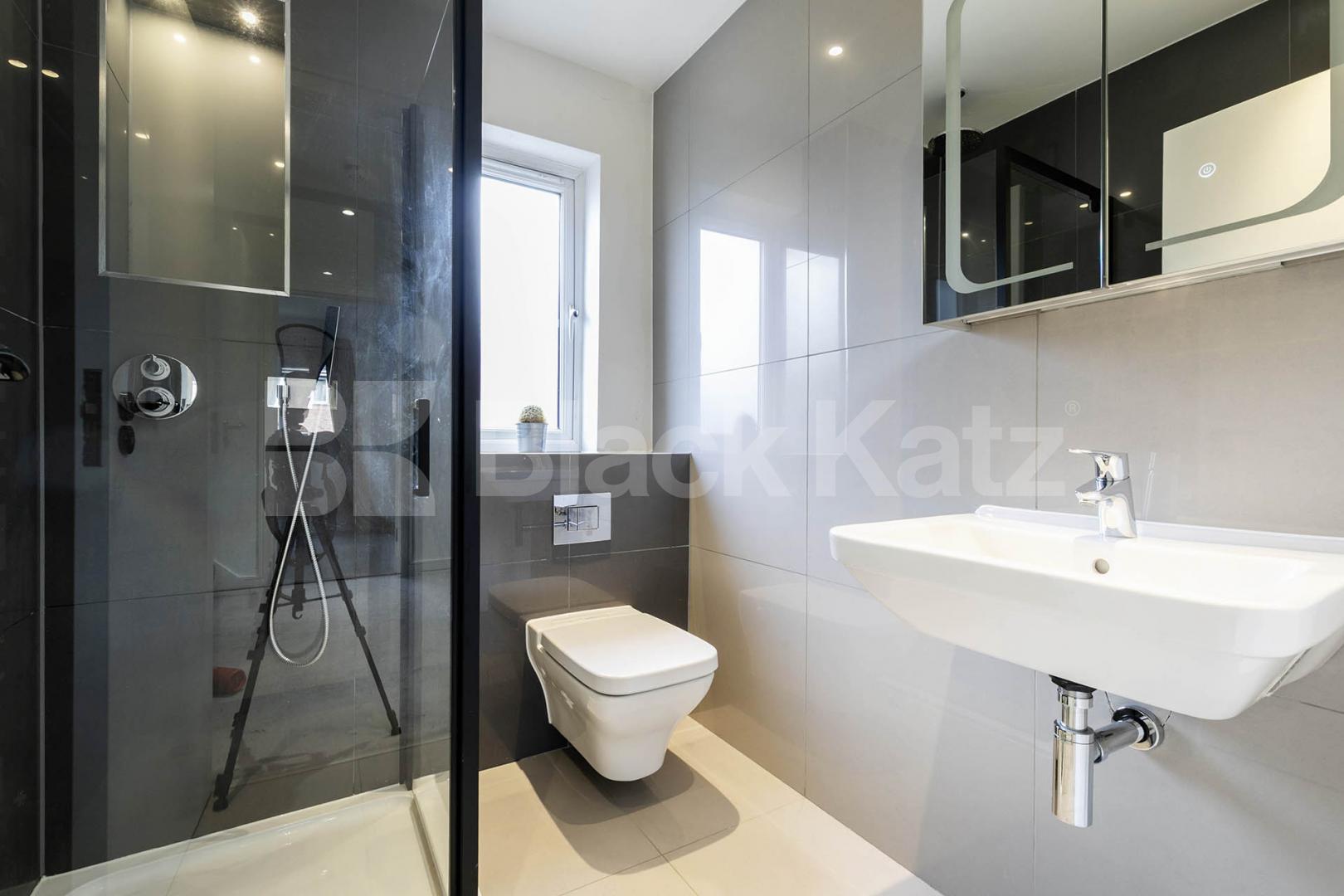 This beautifully presented three-bedroom split-level house is located on the sought-after Lennon Road in the heart of Willesden Green Marley Walk, London, NW2,  London