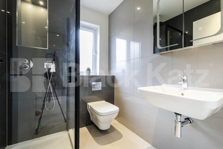 This beautifully presented three-bedroom split-level house is located on the sought-after Lennon Road in the heart of Willesden Green Marley Walk, London, NW2,  London