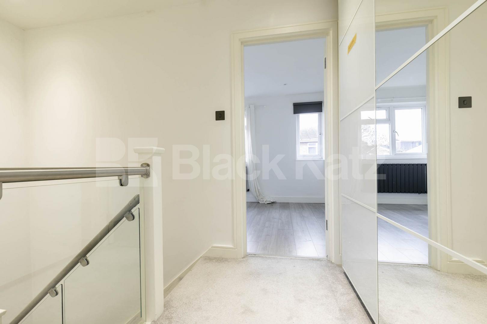 This beautifully presented three-bedroom split-level house is located on the sought-after Lennon Road in the heart of Willesden Green Marley Walk, London, NW2,  London