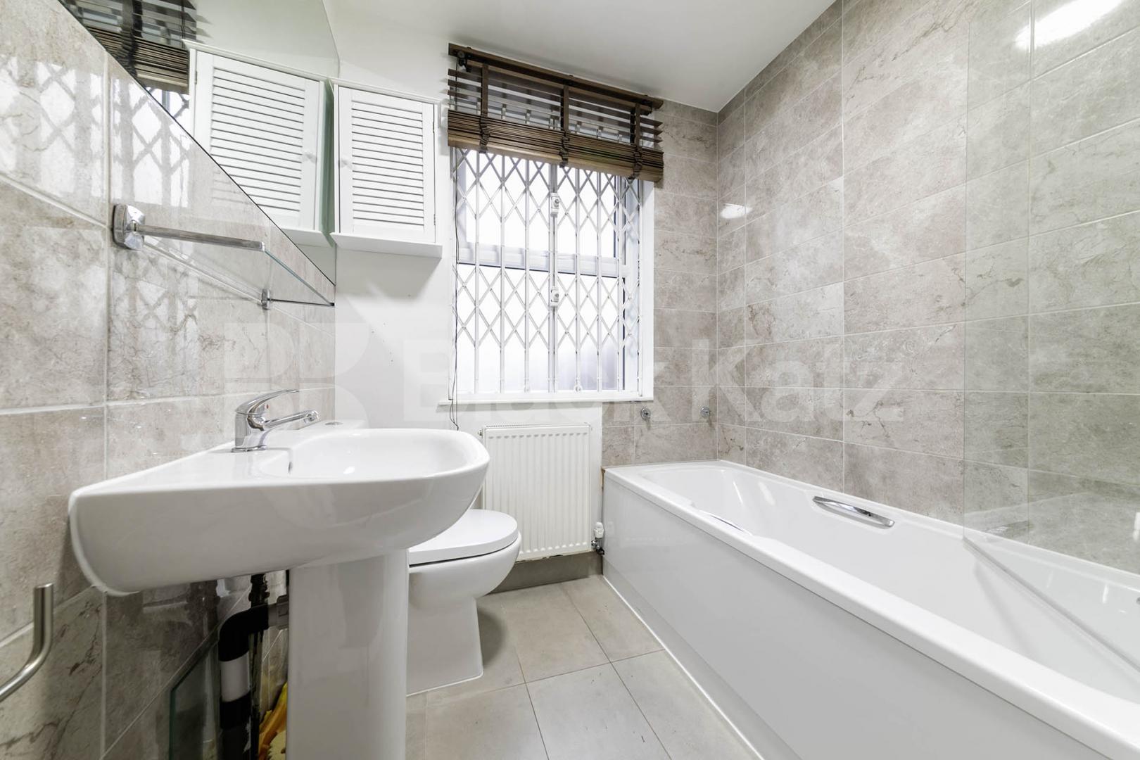 Situated in the heart of Willesden Green, NW2, this spacious four-bedroom, four-bathroom ground floor apartment offers an exceptional amount of living space and is available for immediate occupation Willesden Lane, Maygreen Court, NW2,  Maygreen Court