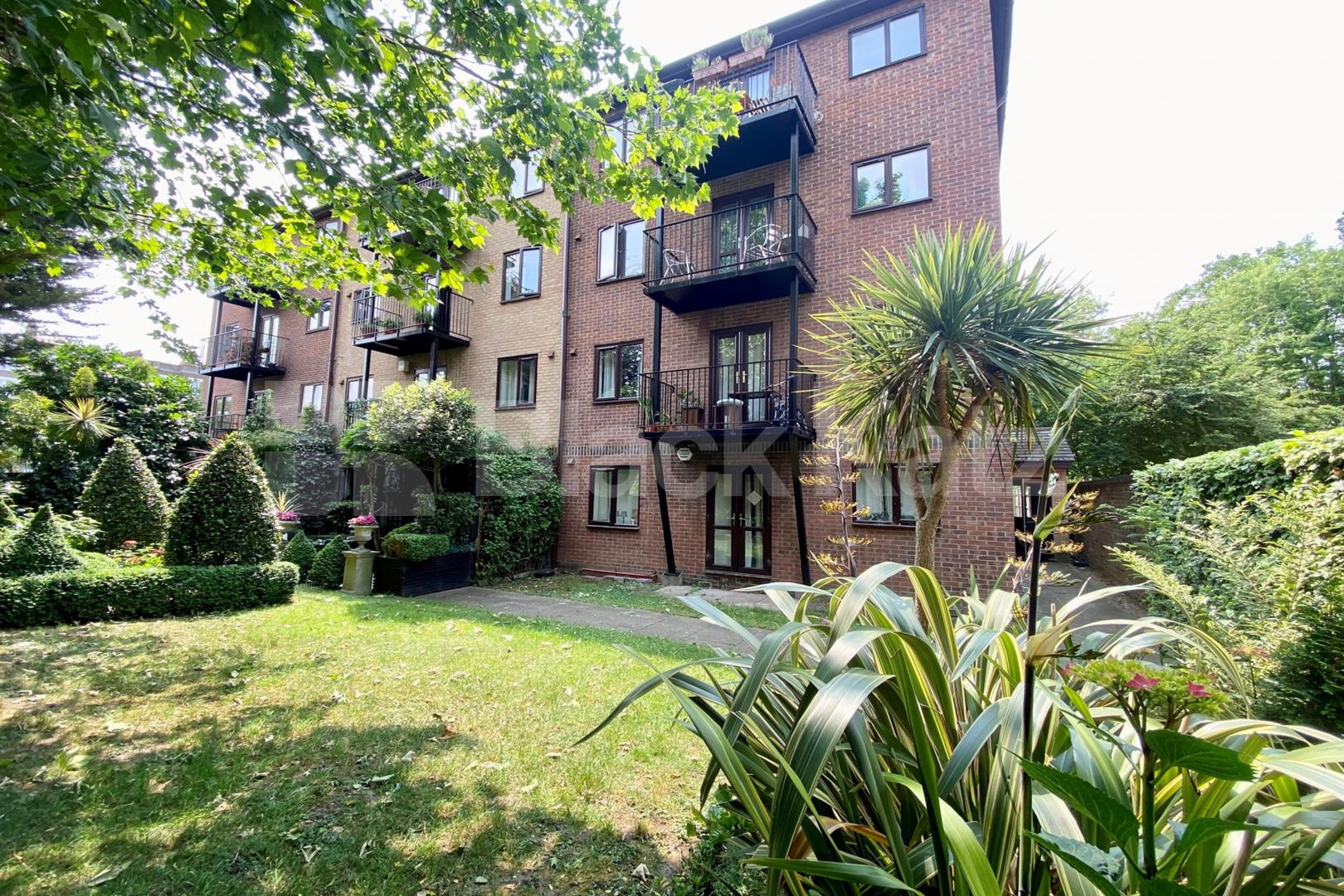 Top floor private development with charming balcony, communal gardens & parking Towergate , Pages Walk 
