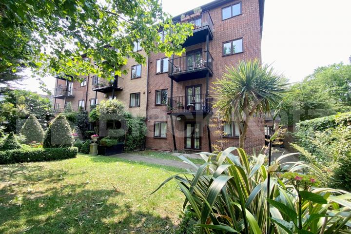 Top floor private development with charming balcony, communal gardens & parking Towergate , Pages Walk 