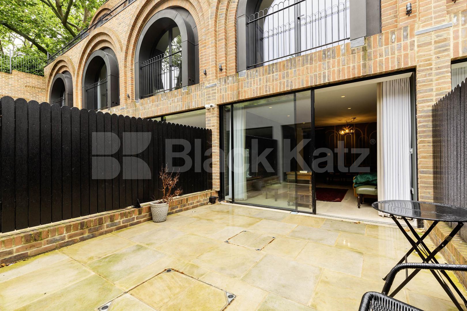 Stunning 3 bed 2 bath house split over 3 floors with a patio area.  Arco Walk, Highgate Road, Kentish Town