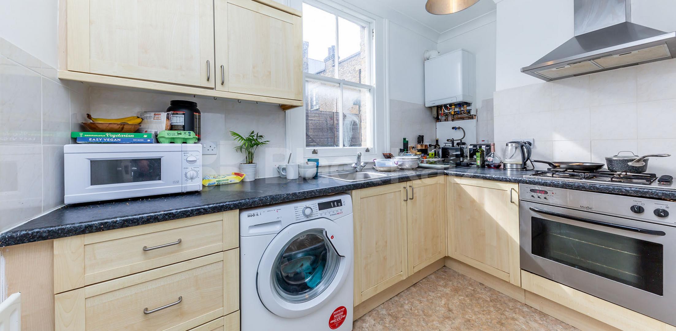 Arranged over two floors located in a period conversion on Chapel Market Chapel market, Angel