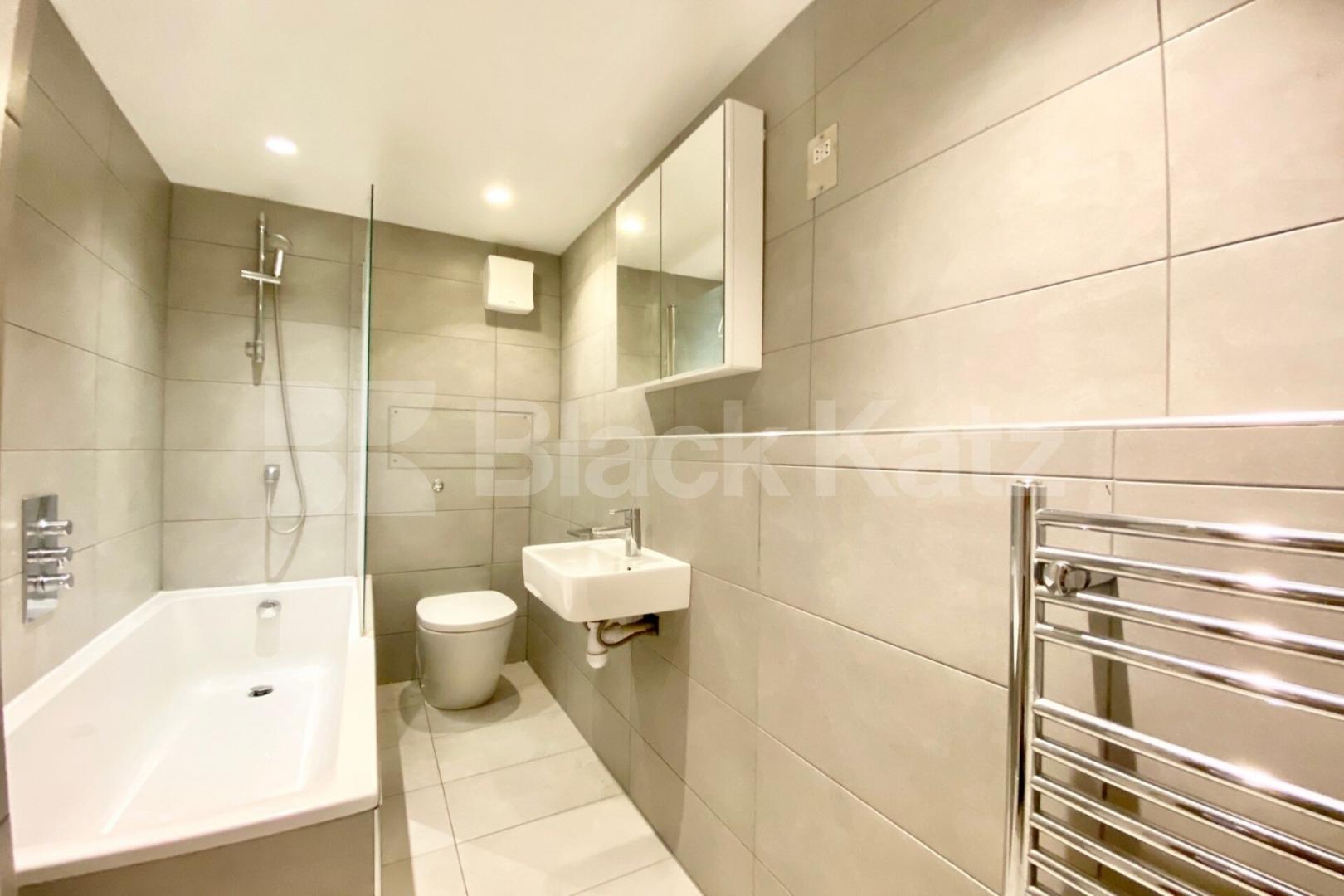 Modern Split level 3 bed 2 bath warehouse conversion with exposed brick Dove Road, Canonbury 