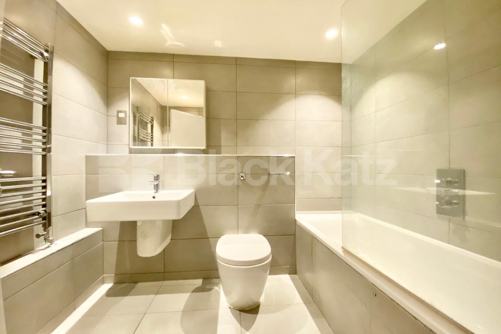 Modern Split level 3 bed 2 bath warehouse conversion with exposed brick Dove Road, Canonbury 