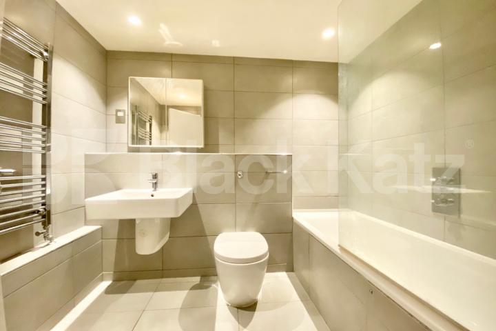 Modern Split level 3 bed 2 bath warehouse conversion with exposed brick Dove Road, Canonbury 