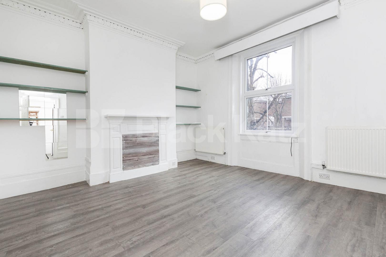 Split over two floors a large 3 bedroom apartment with kitchen diner Hungerford Road, Hillmarton Conservation Area 