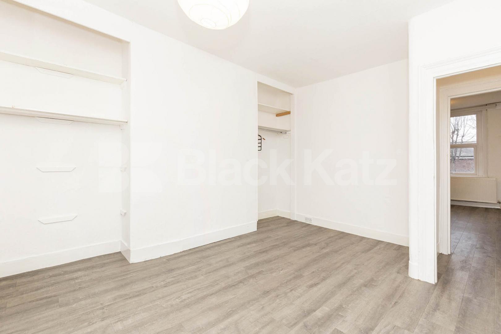 Split over two floors a large 3 bedroom apartment with kitchen diner Hungerford Road, Hillmarton Conservation Area 