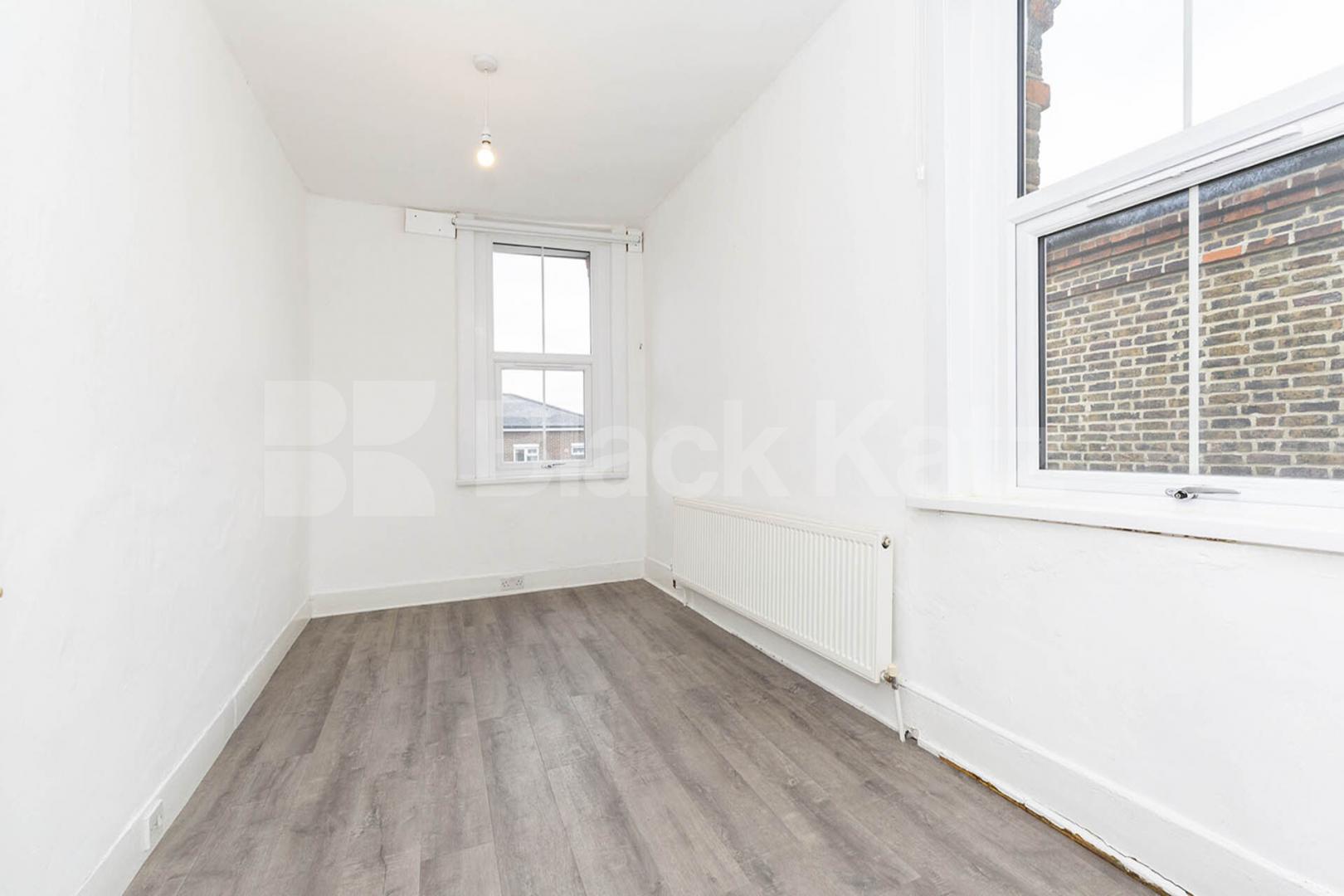 Split over two floors a large 3 bedroom apartment with kitchen diner Hungerford Road, Hillmarton Conservation Area 