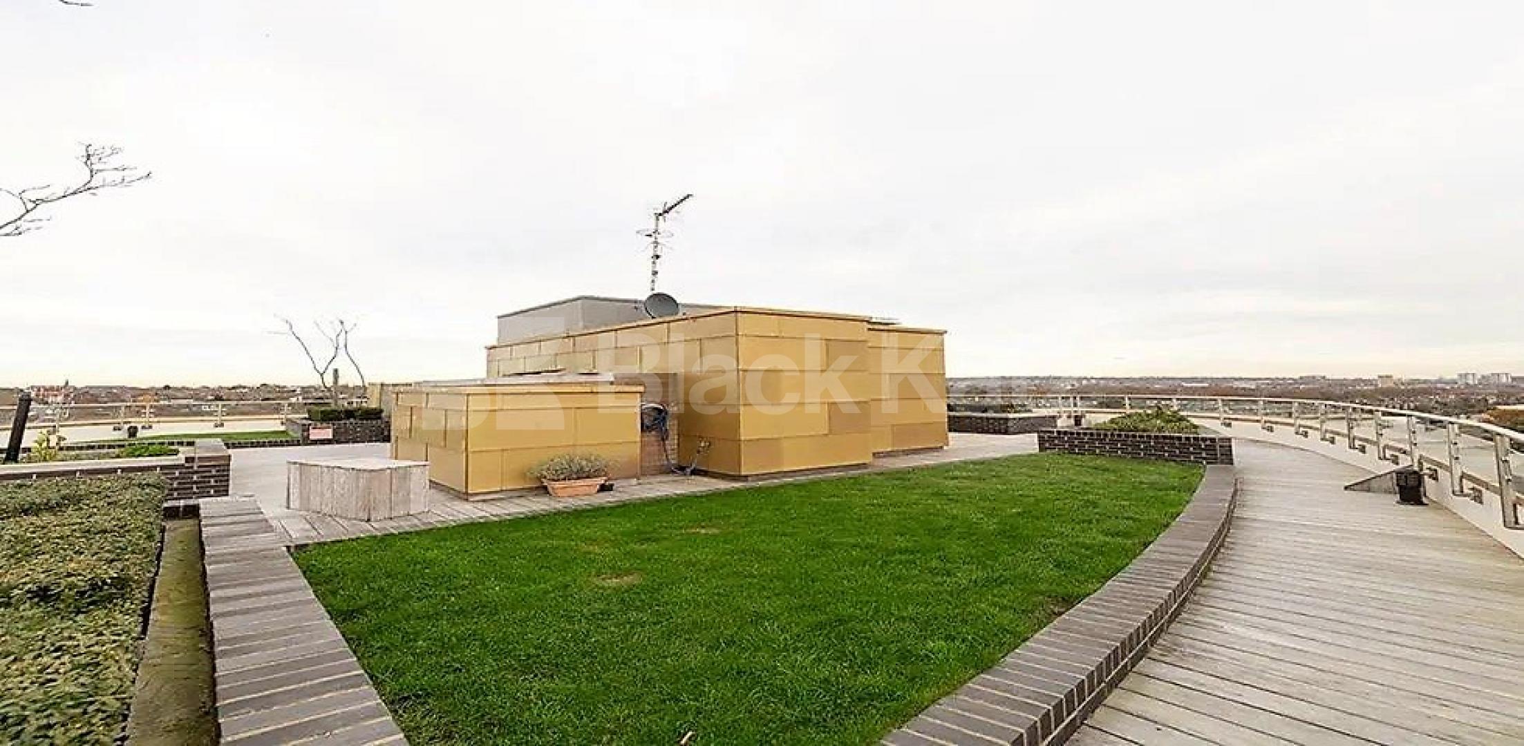 Modern one bed with wood floors and access to a roof terrace near tube & shops Banister Road, Queens Park