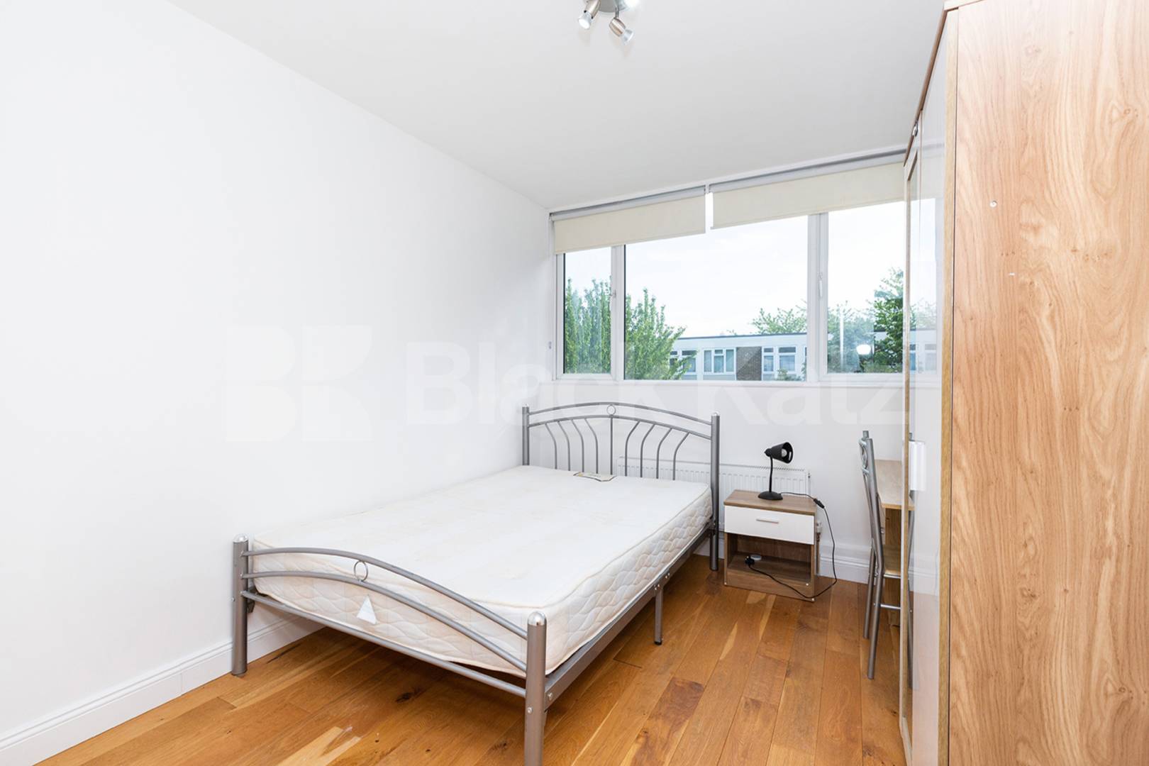 Modern three double bedroom flat arranged over two floors with Balcony Rowstock Gardens, Camden Borders 