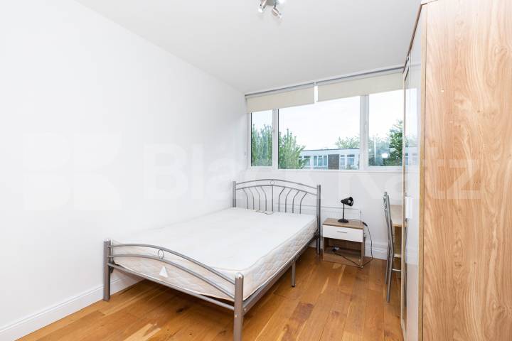 Modern three double bedroom flat arranged over two floors with Balcony Rowstock Gardens, Camden Borders 