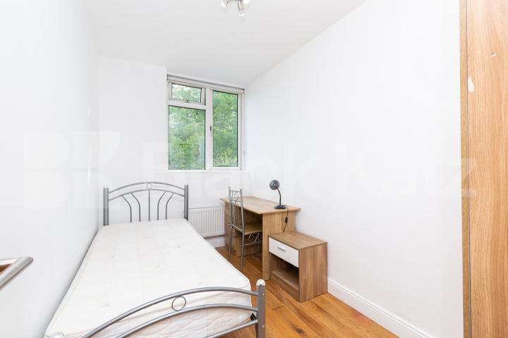 Modern three double bedroom flat arranged over two floors with Balcony Rowstock Gardens, Camden Borders 