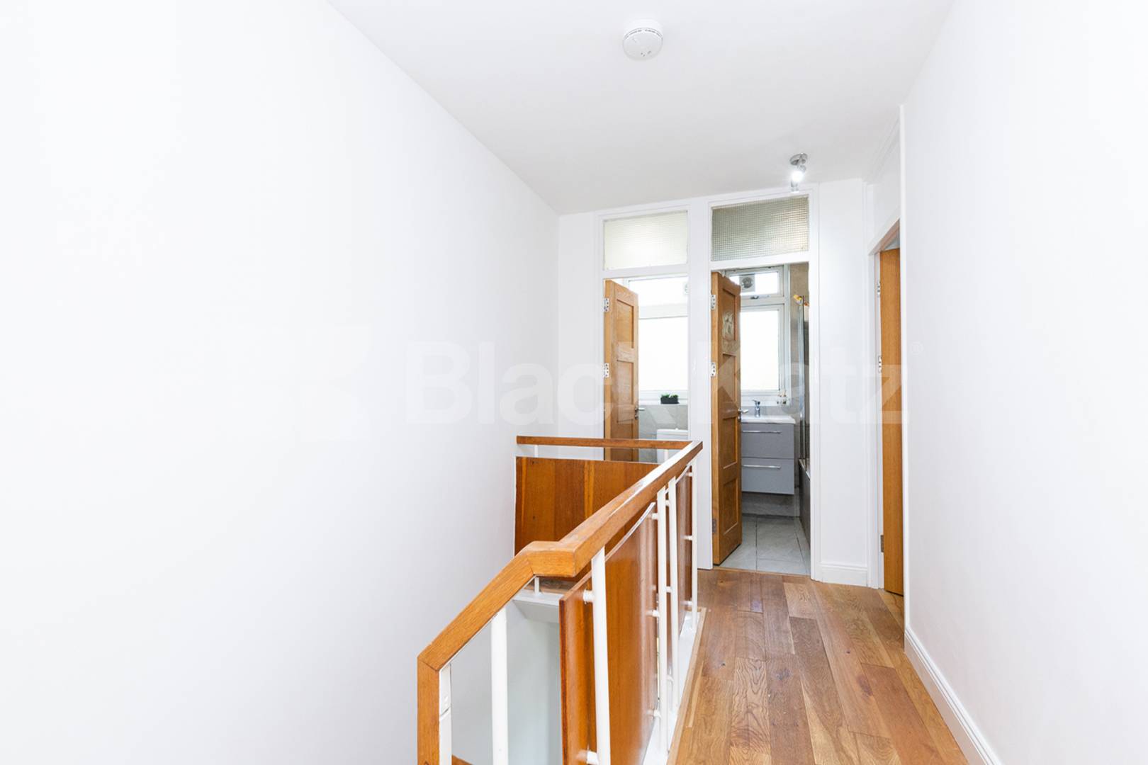 Modern three double bedroom flat arranged over two floors with Balcony Rowstock Gardens, Camden Borders 