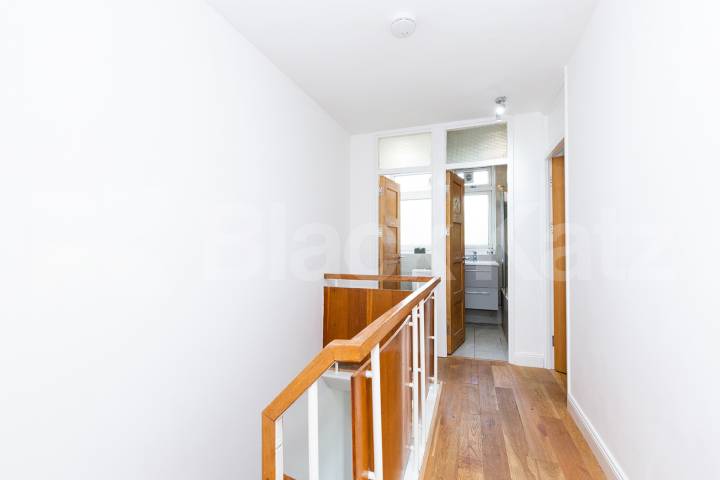 Modern three double bedroom flat arranged over two floors with Balcony Rowstock Gardens, Camden Borders 