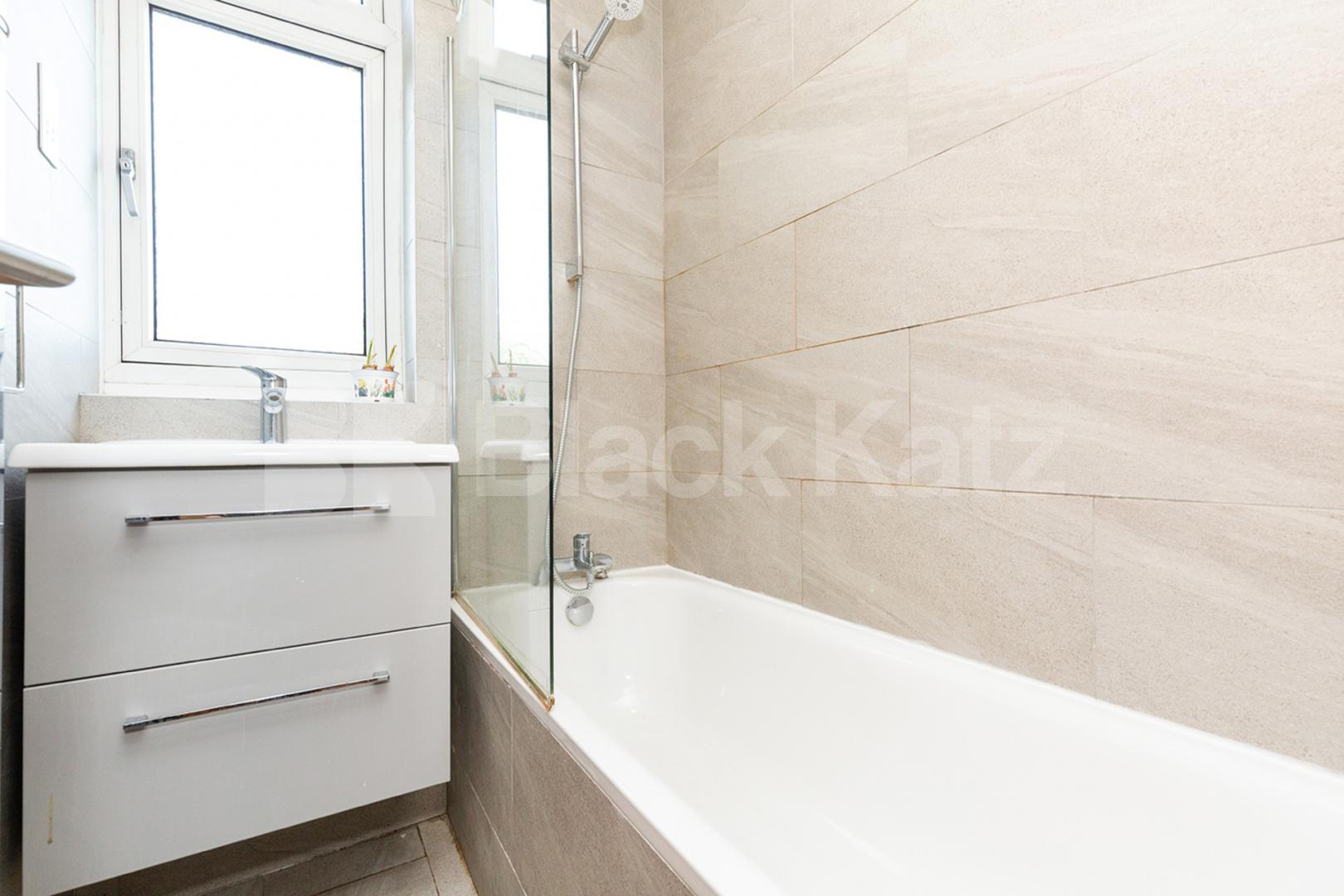 Modern three double bedroom flat arranged over two floors with Balcony Rowstock Gardens, Camden Borders 