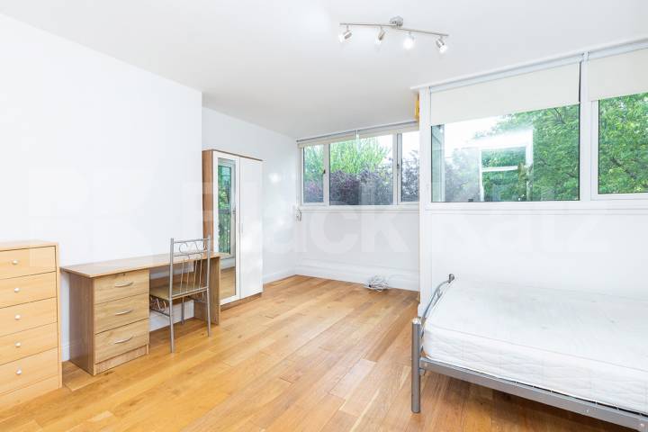 Modern three double bedroom flat arranged over two floors with Balcony Rowstock Gardens, Camden Borders 