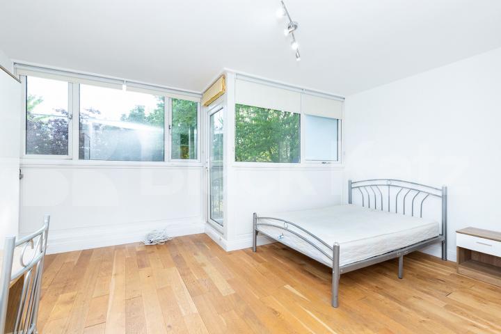 Modern three double bedroom flat arranged over two floors with Balcony Rowstock Gardens, Camden Borders 