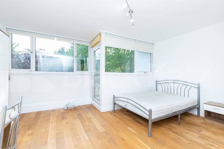 Modern three double bedroom flat arranged over two floors with Balcony Rowstock Gardens, Camden Borders 