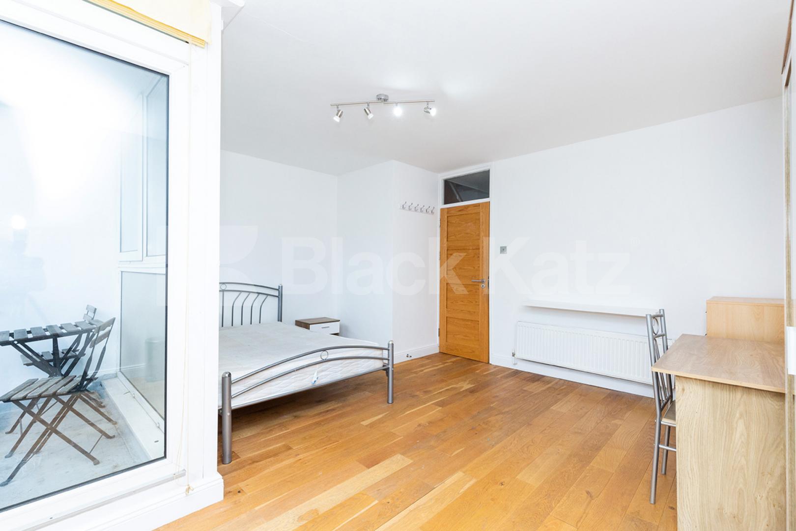 Modern three double bedroom flat arranged over two floors with Balcony Rowstock Gardens, Camden Borders 