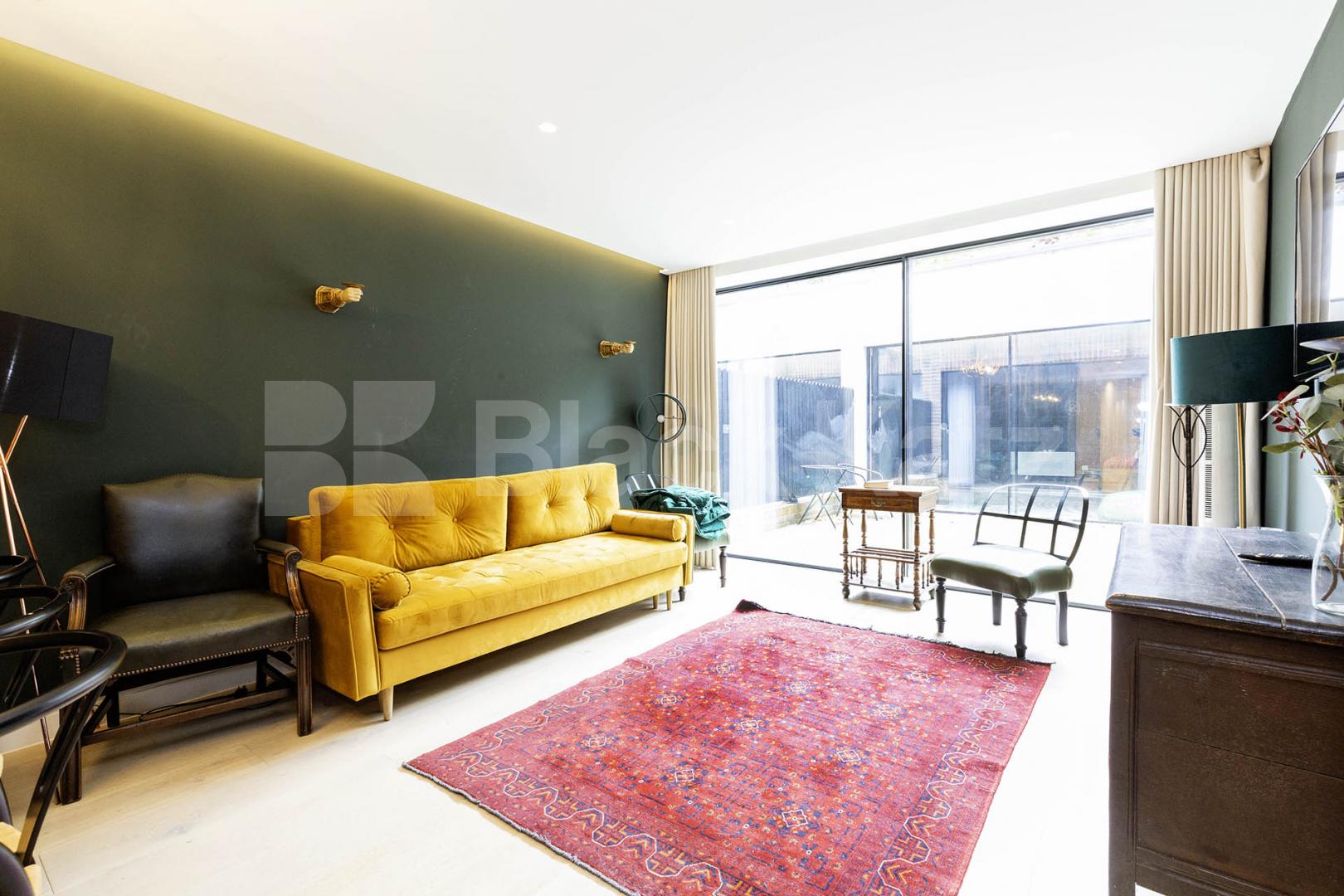 Stunning 3 bed 2 bath house split over 3 floors with a patio area.  Arco Walk, Highgate Road, Kentish Town