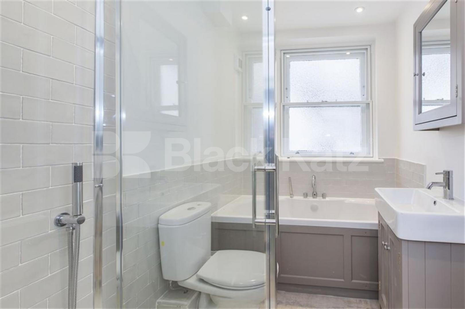 Spacious three double bedroom apartment set within a handsome period conversion Camden Road, Camden Borders 