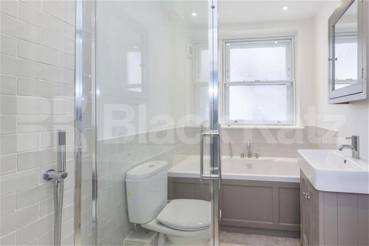 Spacious three double bedroom apartment set within a handsome period conversion Camden Road, Camden Borders 