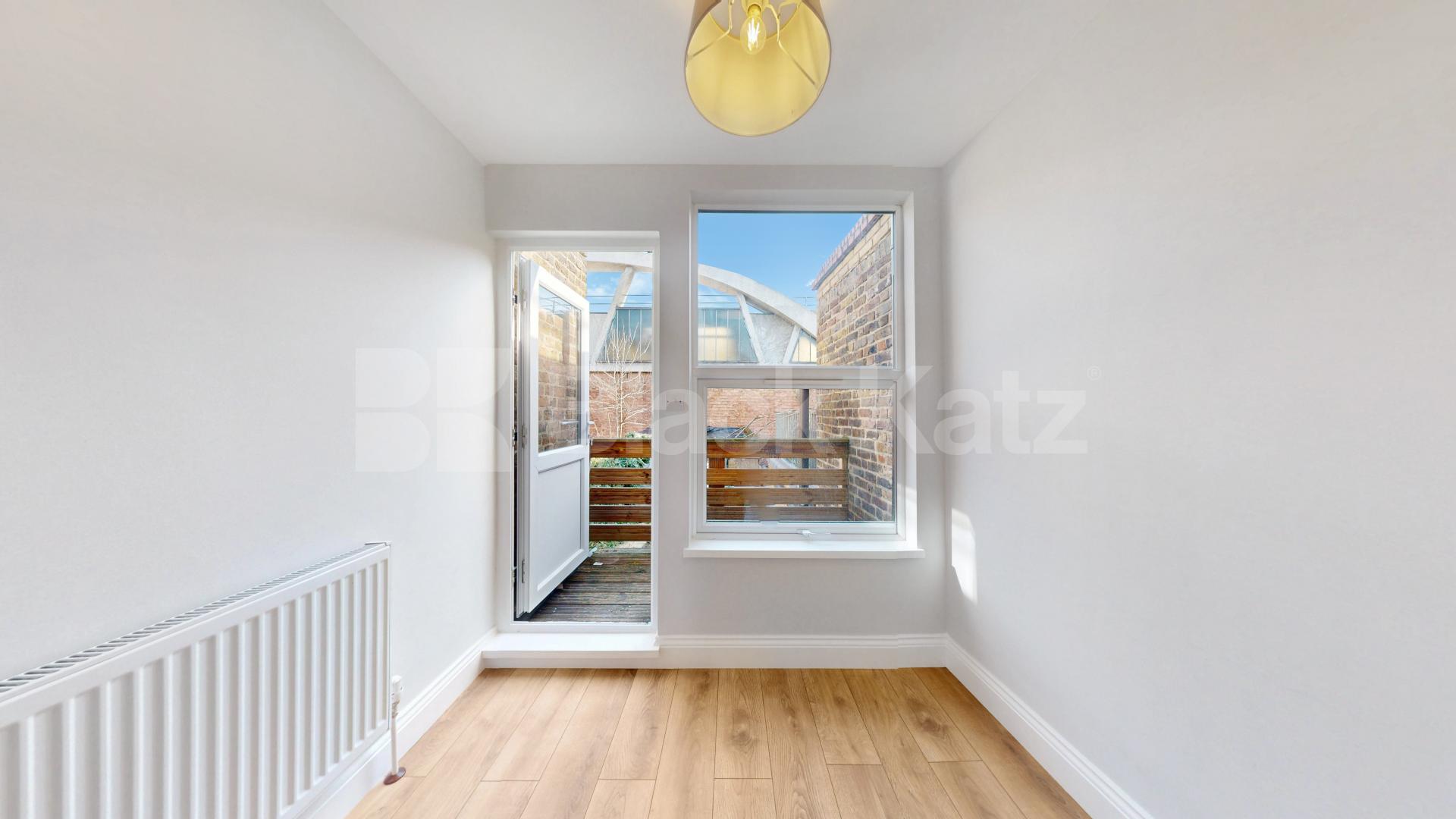 Set on the sought-after Wells Road in the heart of Shepherd's Bush, this recently renovated one-bedroom flat offers stylish living within an attractive period conversion.The property features a bright and spacious separate reception room, ideal for b Wells Road, London, W12,  London