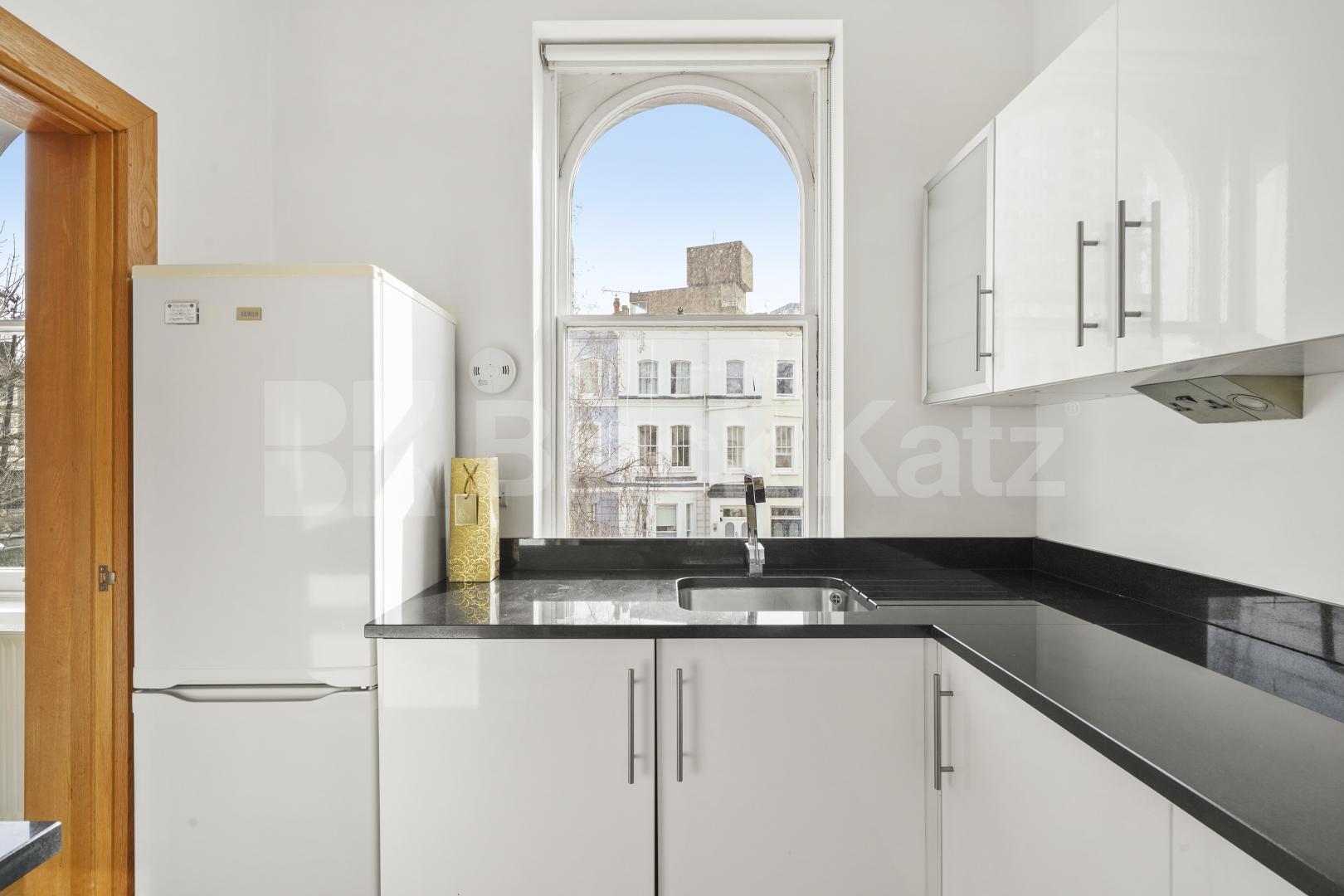 A spacious and well-presented two-bedroom, two-bathroom furnished apartment situated on the first floor of a well-maintained period building on the sought-after Priory Terrace, NW6.The property offers two generous double bedrooms, including a princip Priory Terrace, London, NW6,  London
