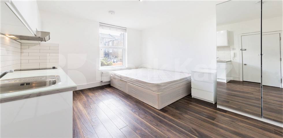 A bright, fully furnished studio in NW10, featuring an open-plan living space, fitted kitchenette, and private bathroom Rucklidge Avenue, London, NW10,  London