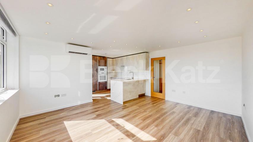 A stunning fully renovated three-bedroom apartment finished to an exceptional high standard throughout The Oaks, London, NW6,  The Oaks