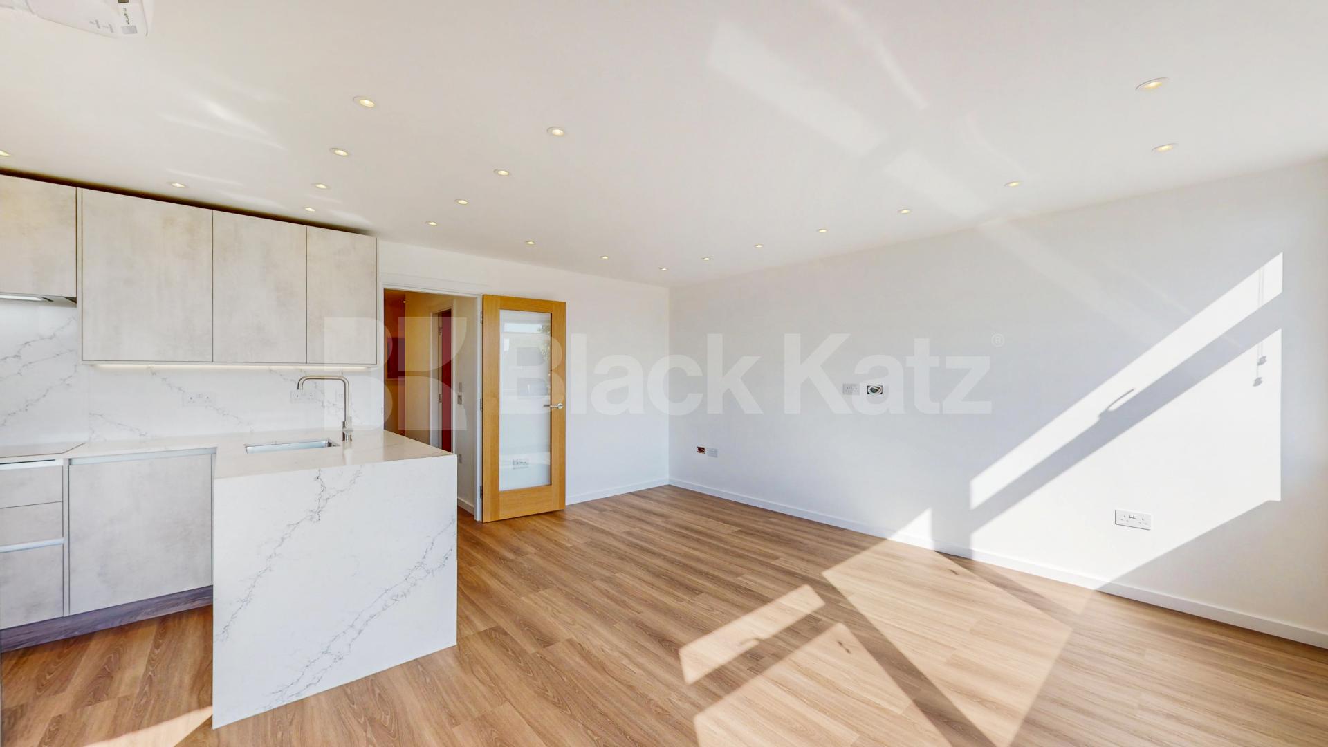 A stunning fully renovated three-bedroom apartment finished to an exceptional high standard throughout The Oaks, London, NW6,  The Oaks