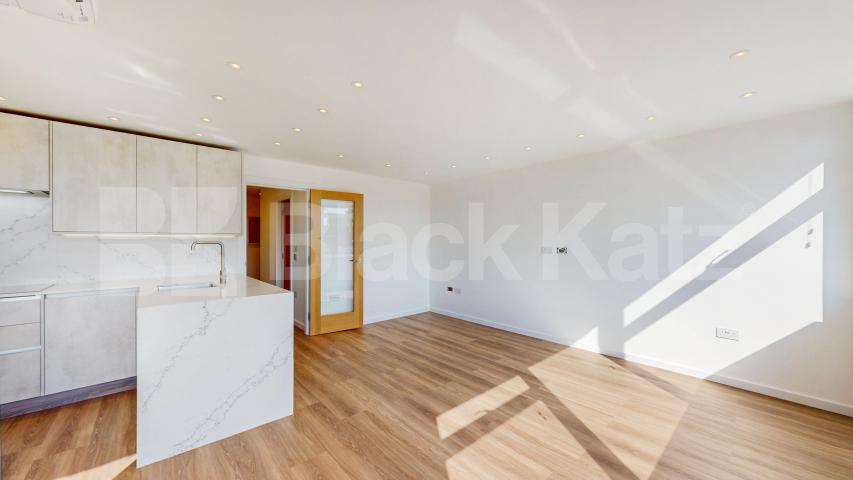 A stunning fully renovated three-bedroom apartment finished to an exceptional high standard throughout The Oaks, London, NW6,  The Oaks