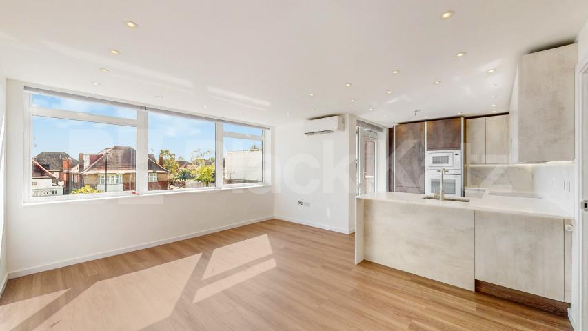 A stunning fully renovated three-bedroom apartment finished to an exceptional high standard throughout The Oaks, London, NW6,  The Oaks