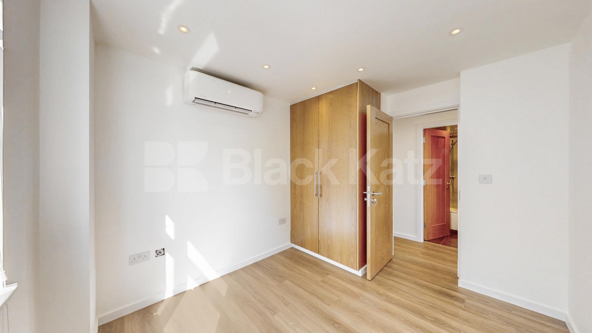A stunning fully renovated three-bedroom apartment finished to an exceptional high standard throughout The Oaks, London, NW6,  The Oaks