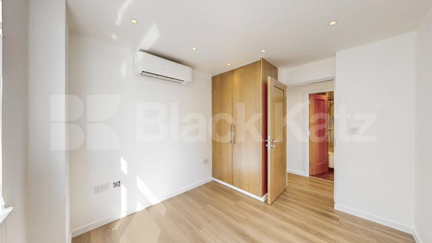 A stunning fully renovated three-bedroom apartment finished to an exceptional high standard throughout The Oaks, London, NW6,  The Oaks