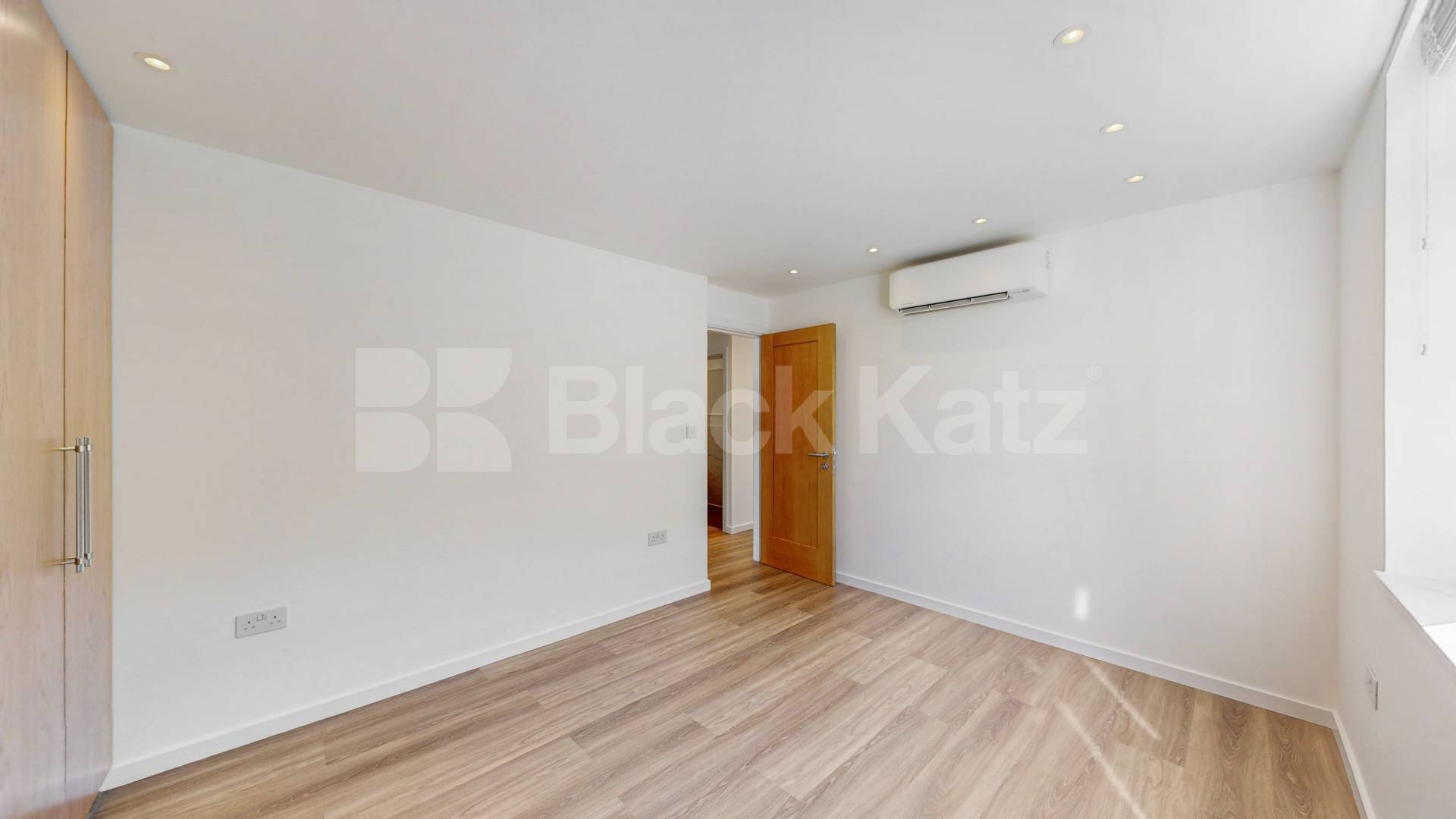 A stunning fully renovated three-bedroom apartment finished to an exceptional high standard throughout The Oaks, London, NW6,  The Oaks